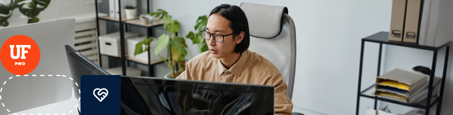 Person at computer with UF logo and shield emblem, symbolizing the choice of EC-Council